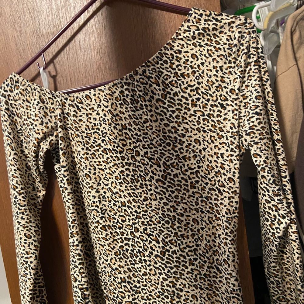 Off shoulder cheetah print long sleeve top